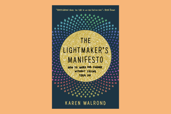 An illustration of a navy blue book cover featuring colorful circular dots radiating outwards from a golden circle center. “Karen Walrond shines her light so we can find out own - Brené Brown” is written at the top with “THE LIGHTMAKER’S MANIFESTO” and “HOW TO WORK FOR CHANGE WITHOUT LOSING YOUR JOY” written in the center. The author’s name, “KAREN WALROND,” is written at the bottom.